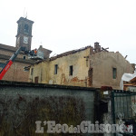 Osasio: è iniziata la demolizione dell’ex casa parrocchiale 
